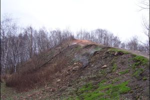 View of the Ema spoil heap with smoke emissions (10/2009)